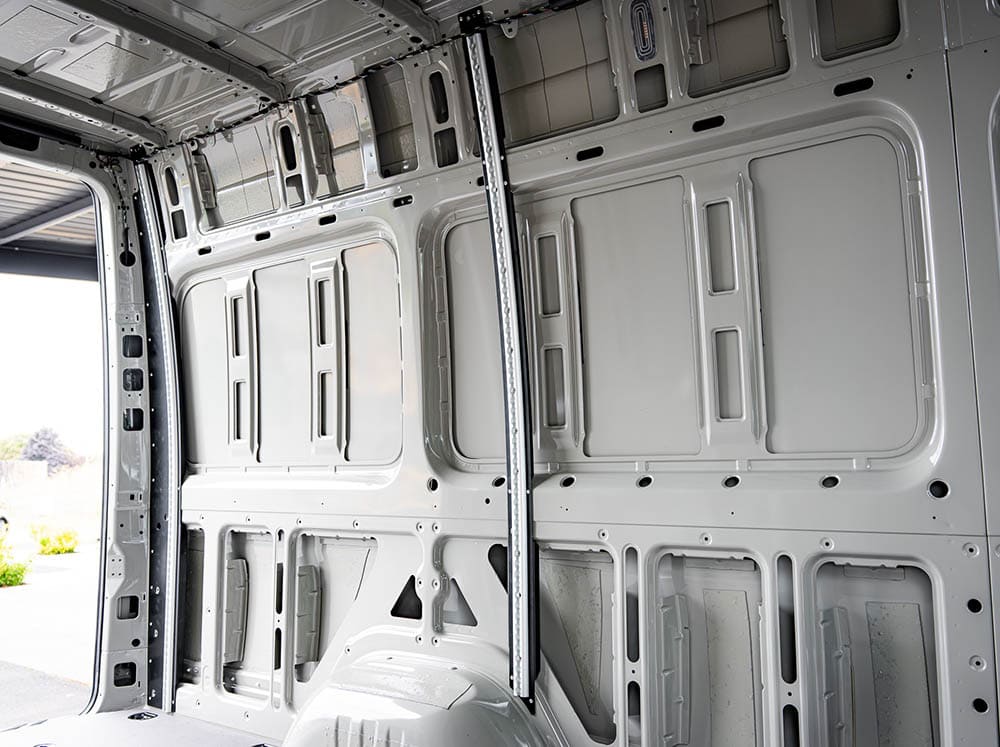 Driver's side of Sprinter Van Bed Bracket L-Track Kit installed on Sprinter Bed Brackets
