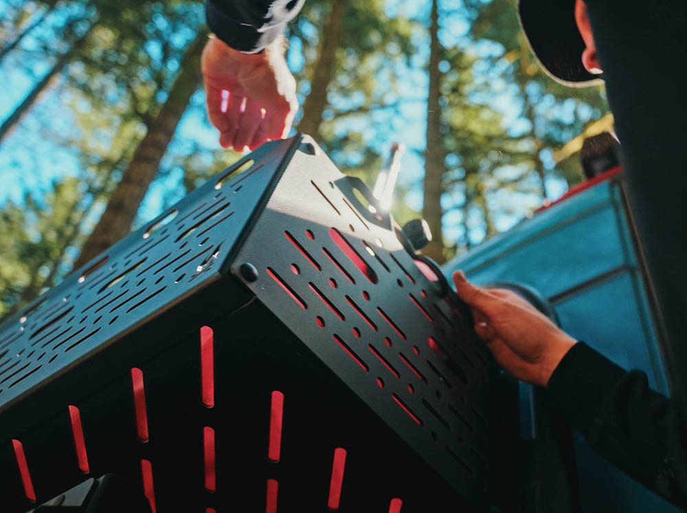 Storing fuel cans in Rear Door Gear Cage for adventure vans