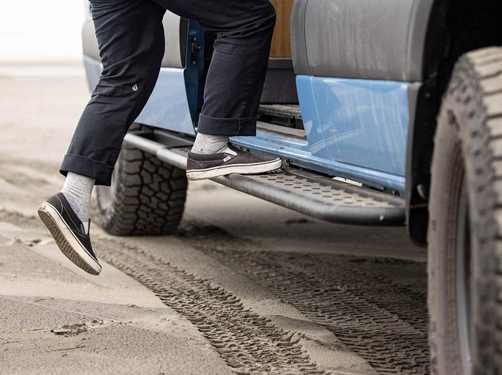 Man stepping on Sprinter 170" Side Step