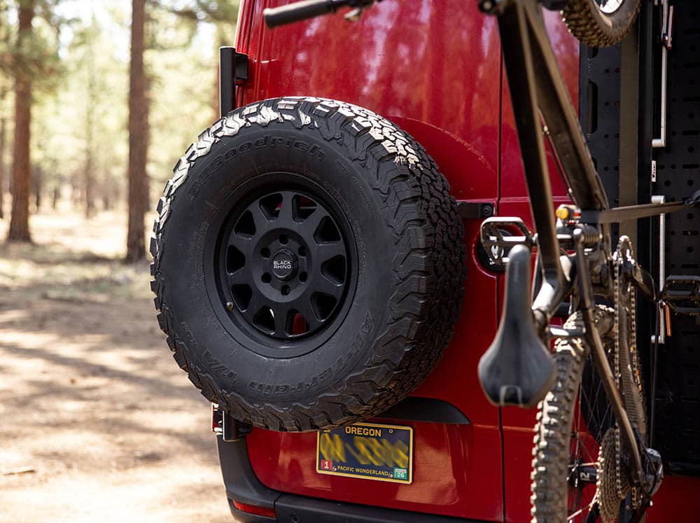 Rear Tire Carrier on red Sprinter van