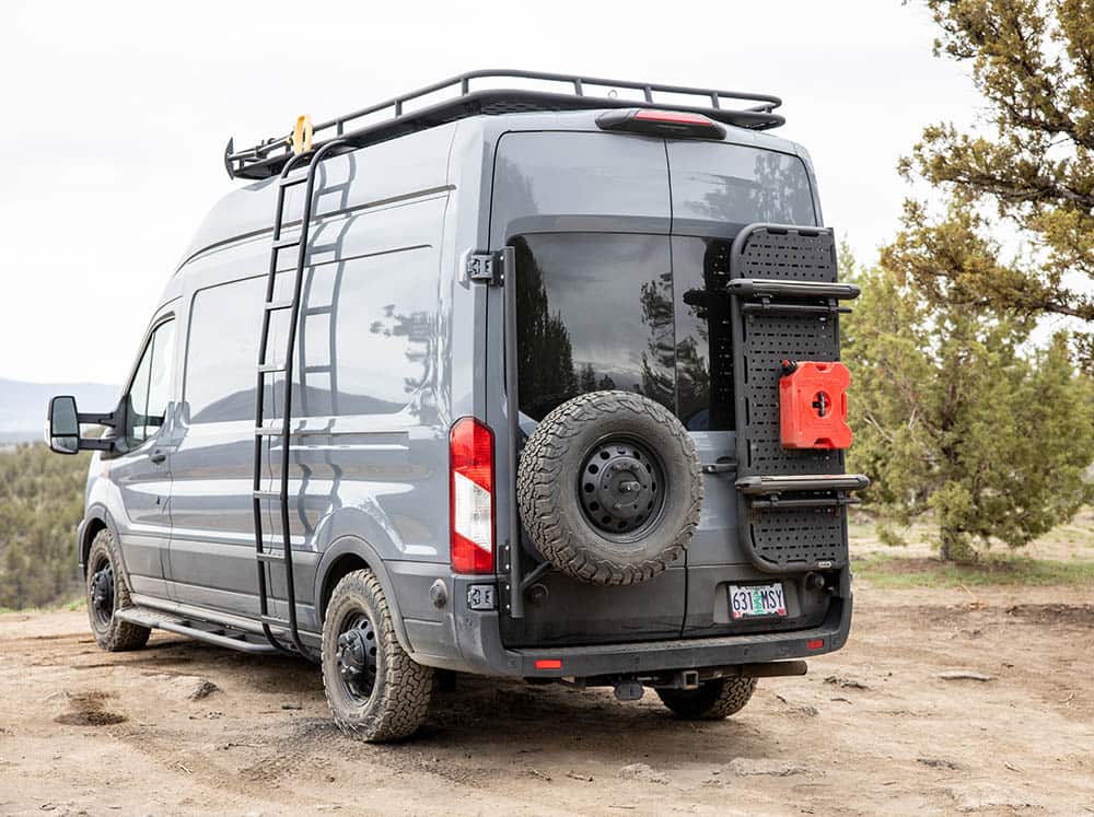 Ford Transit van with rear door tire carrier and other accessories