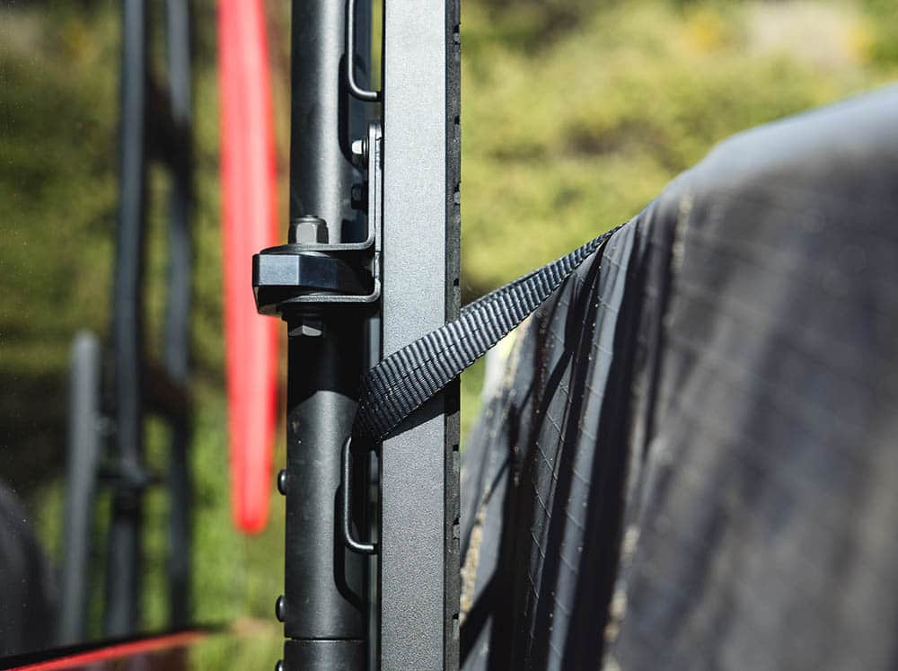 Built-in place to strap surfboards on universal surf hooks