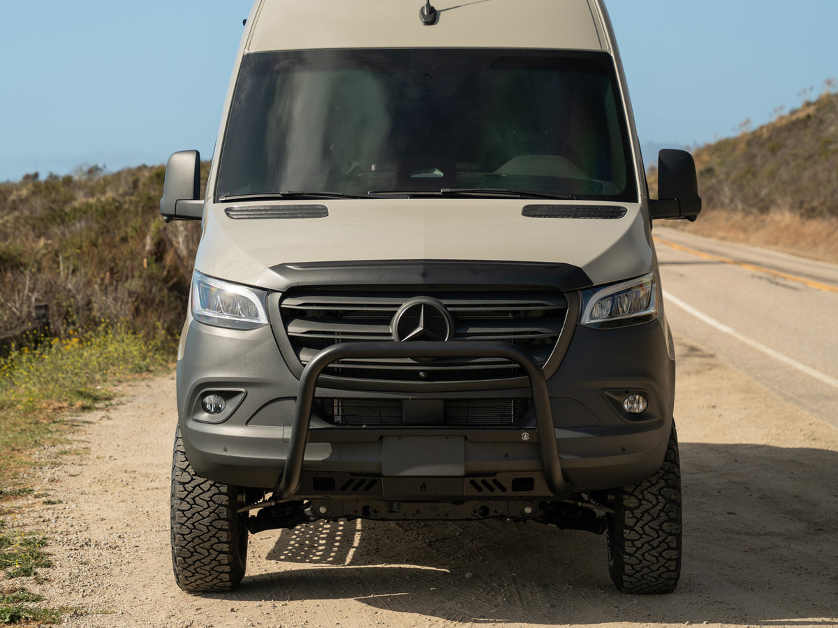 Front facing view of Mercedes-Benz Sprinter van with FVC Bull Bar and Skid Plate installed