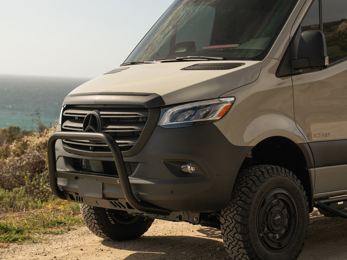 Angled view of Mercedes-Benz Sprinter van with FVC Bull Bar and Skid Plate installed