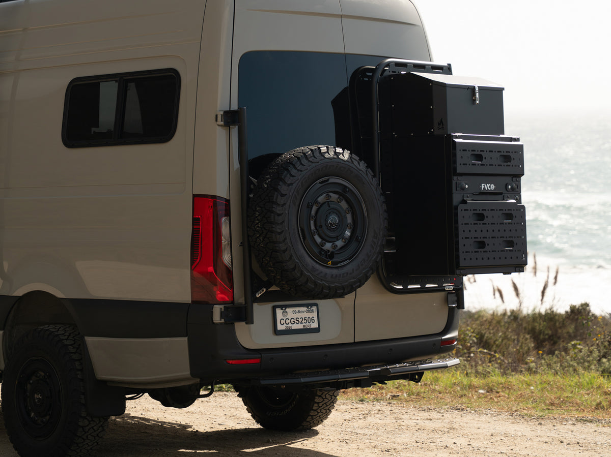 Sprinter Rear Door Tire Carrier installed next to Rear Door Platform with storage box organization