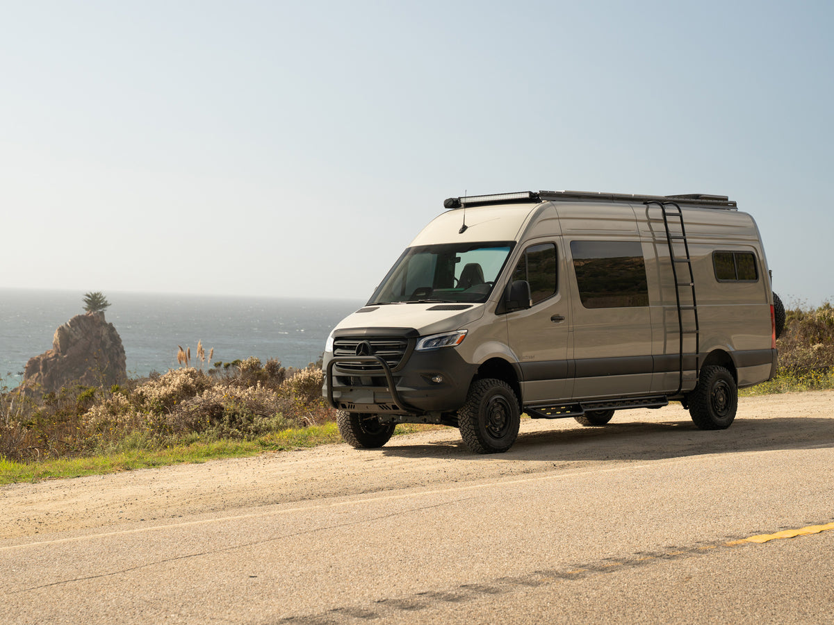 Mercedes-Benz Sprinter Van with FVC roof rack, bull bar, skid plate, side ladder, side steps, and rear door upgrades installed