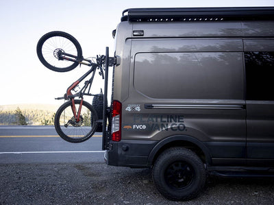 Side view of Ford Transit Van with Rear Door Platform carrying bikes