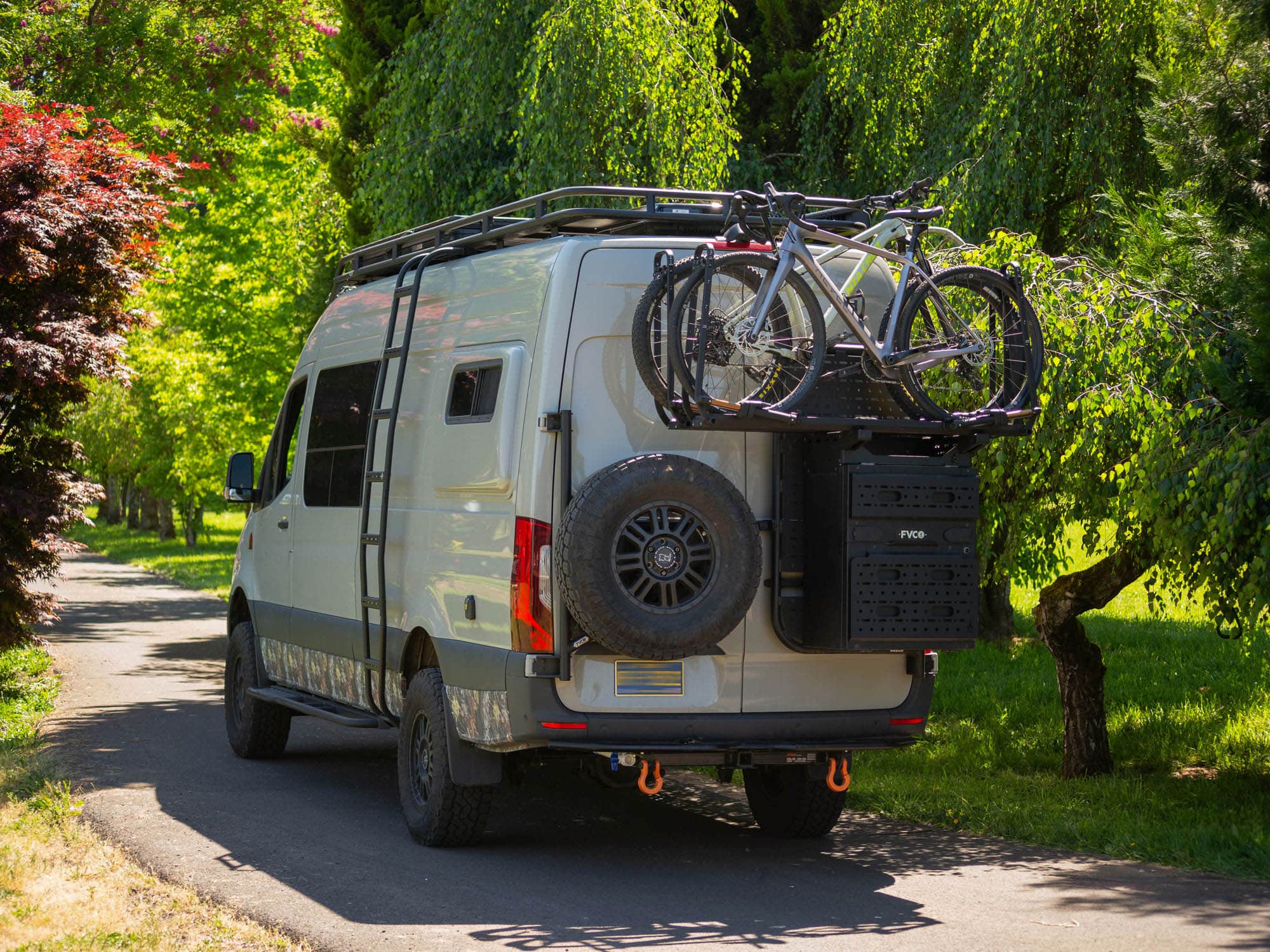 Sprinter camper van with bikes stowed on Rear Storage Box Bike Rack Adapter