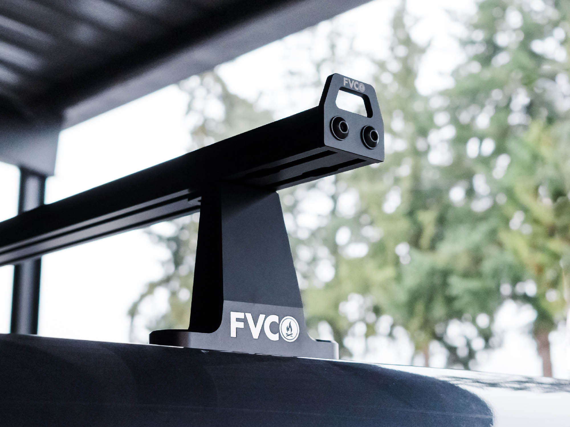 View of Standard 59.75" wide crossbars with Sprinter Crossbar Roof Rack towers on high roof van