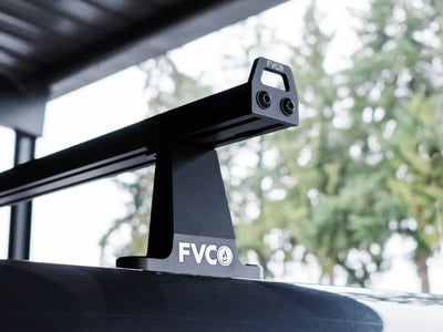 View of Standard 59.75" wide crossbars with Sprinter Crossbar Roof Rack towers on high roof van