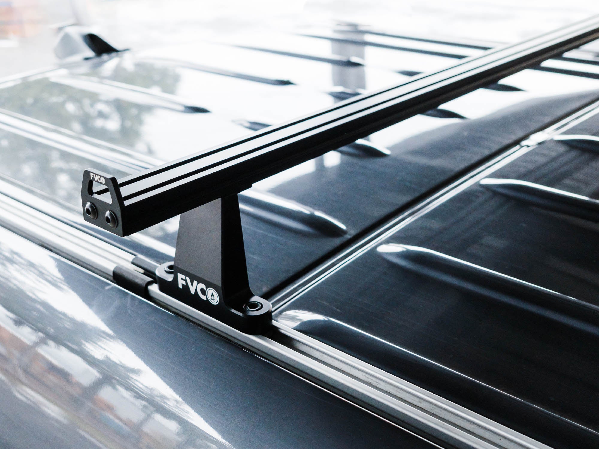 Sprinter Van Crossbar Roof Rack quickly installs in roof rails of Mercedes-Benz Sprinter vans