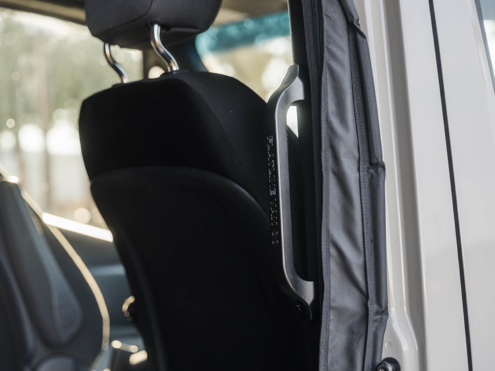 Sprinter Slider Grab Handle with black logo installed in Sprinter VS30 camper van