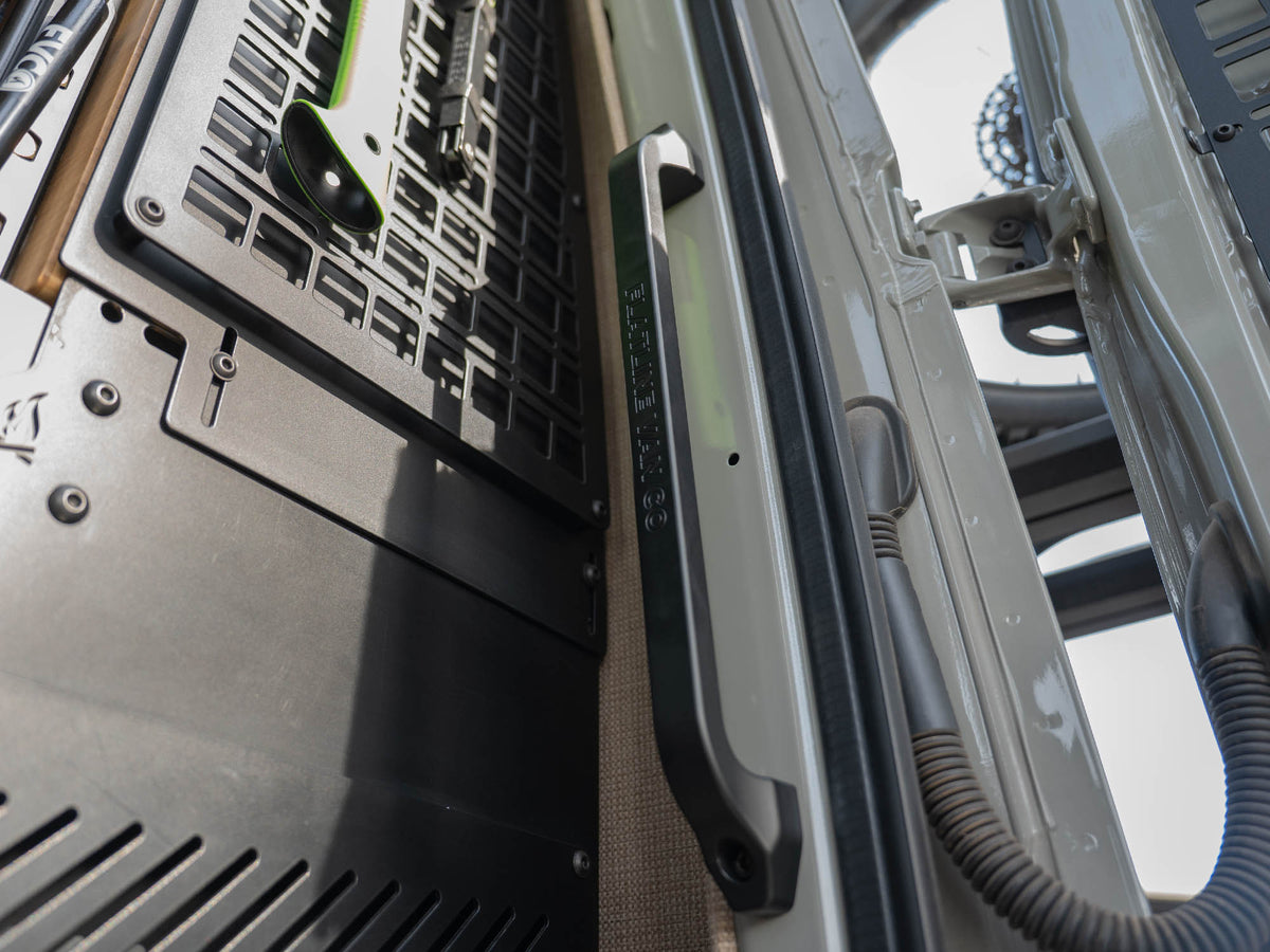 Black etched logo option of the Sprinter Van Rear Door Grab Handle installed