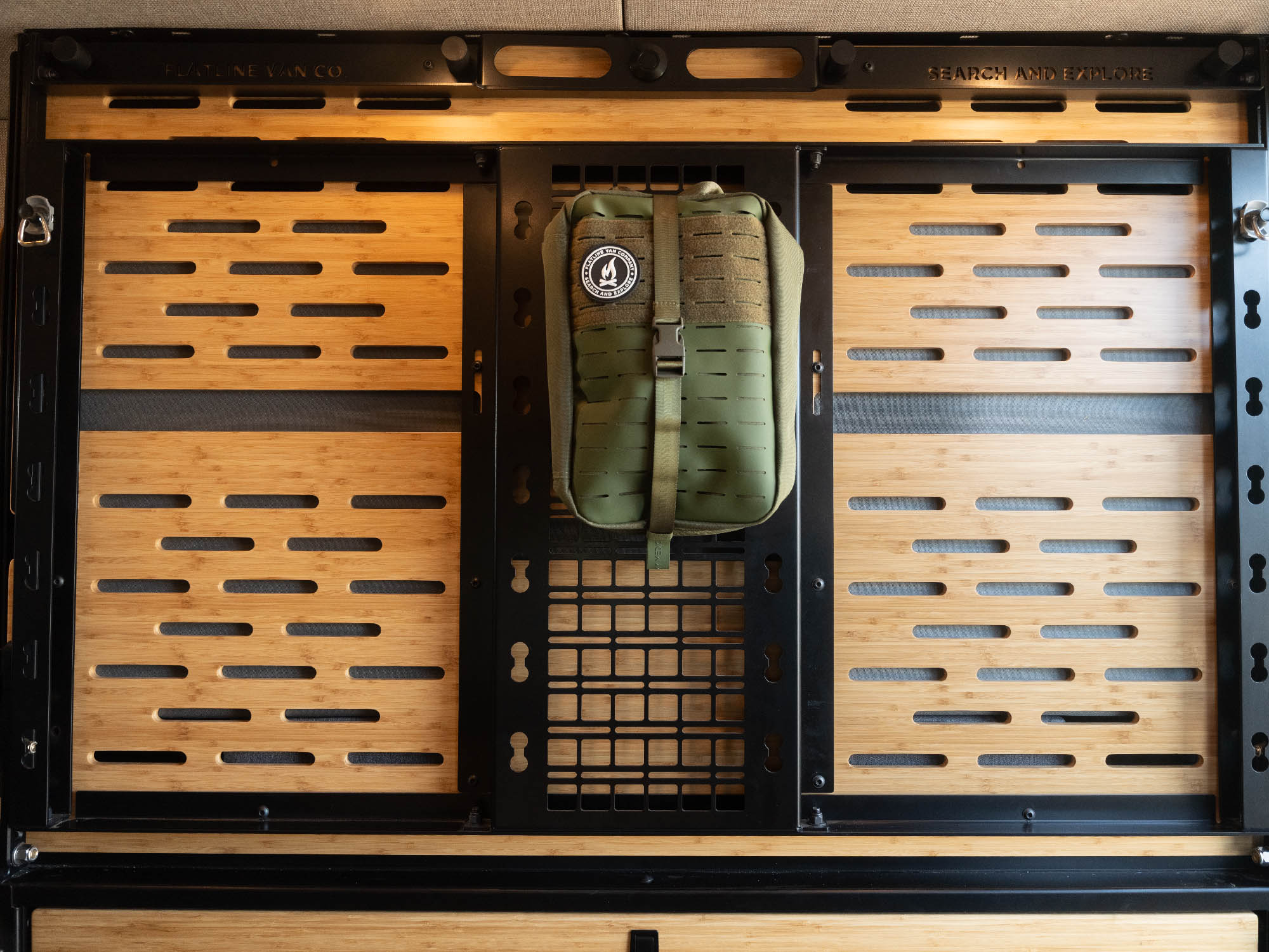 Sprinter Murphy Bed with built-in Molle panel on the underside of the bed