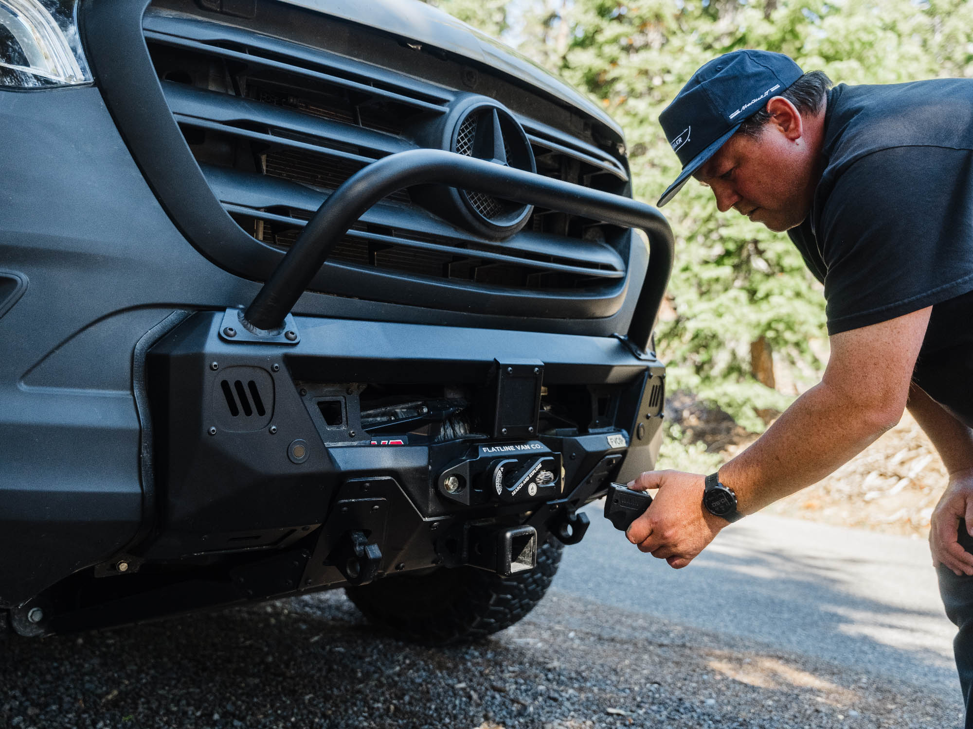 Preparing to mount gear carrier on the front hitch of Sprinter Core Front Bumper