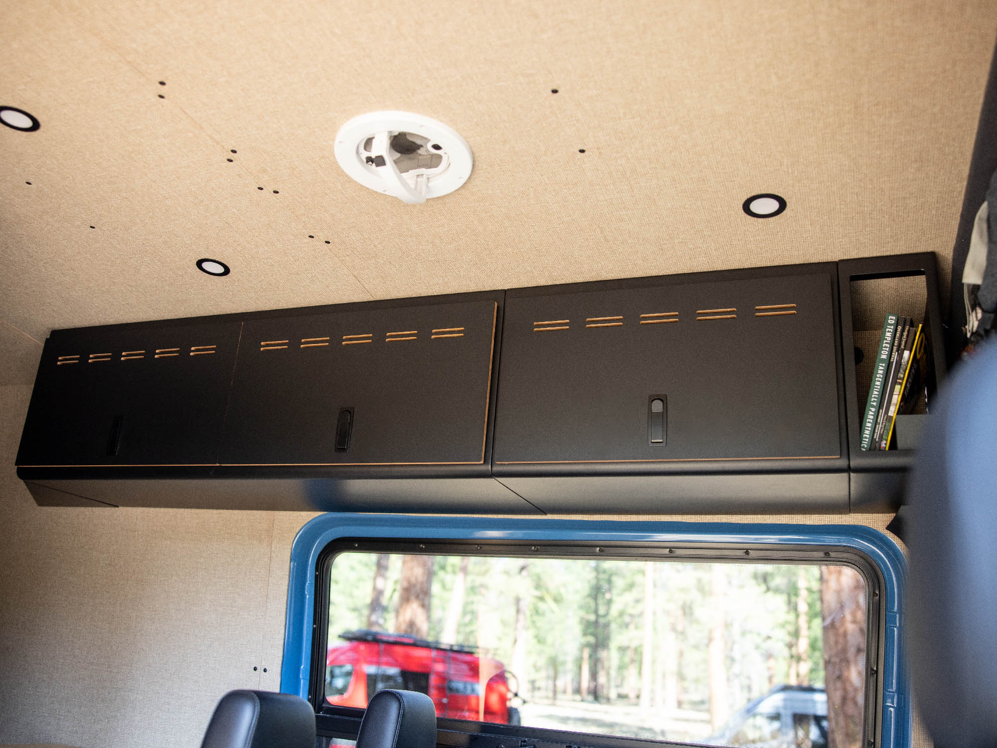 Sprinter van with 48" Upper Cabinet, 24" Upper Cabinet, and 6" Open Shelf by FVC