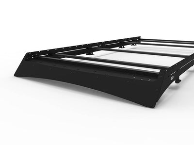 Front view of Transit 148" High Roof Low Pro Roof Rack with light bar compatible fairing