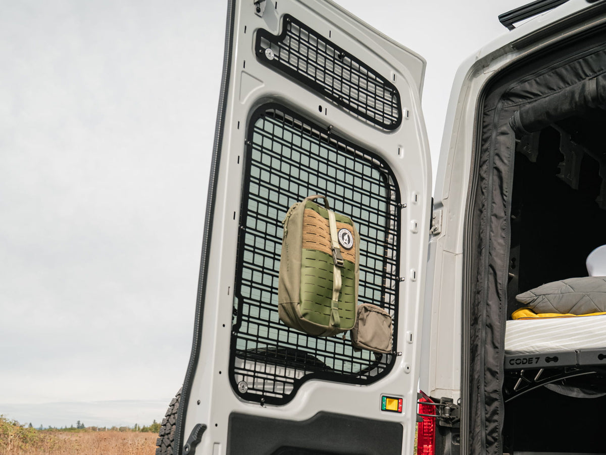 Rear Window Transit Rear Door Molle Panel with molle pouches attached