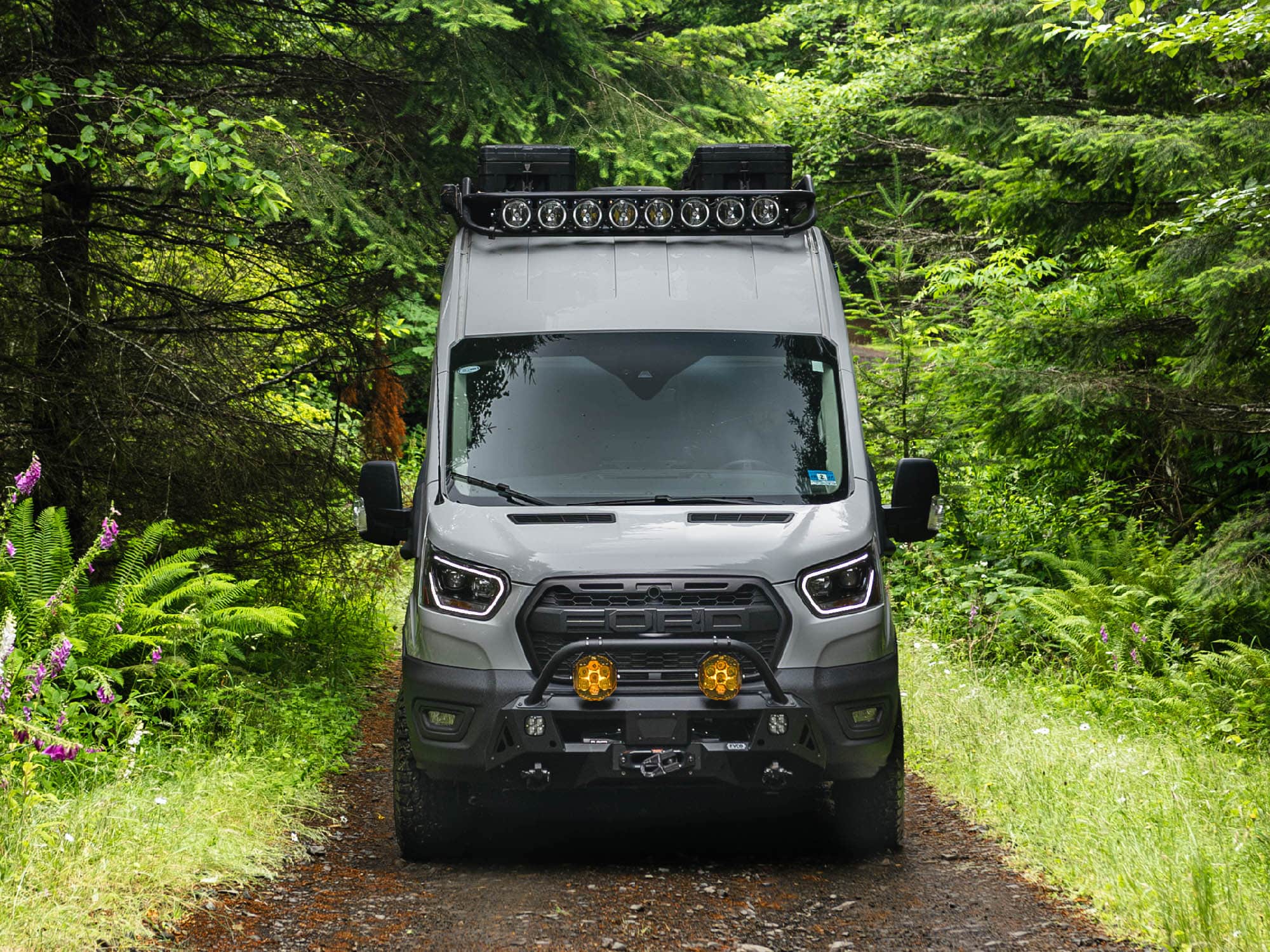Front view of Transit Van Core Front Bumper installed with Bull Bar option and auxiliary lighting