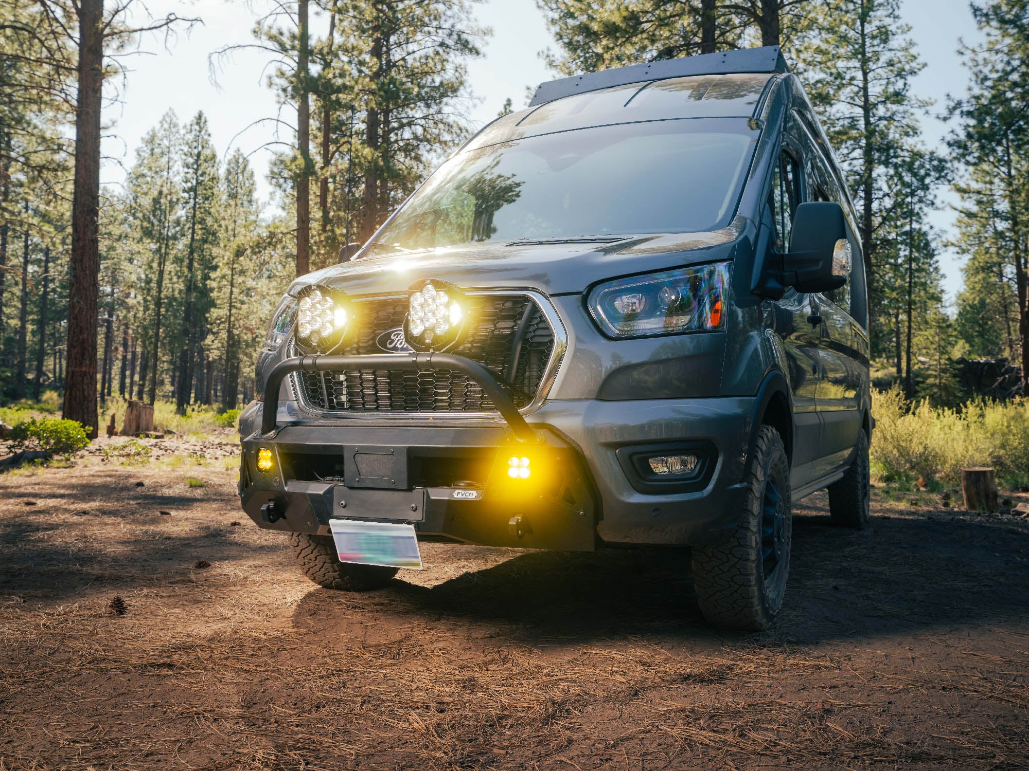 Ford Transit front bumper with Baja Designs auxiliary lights installed