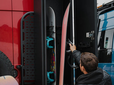 Adventure van ski and snowboard locker installed on rear door platform