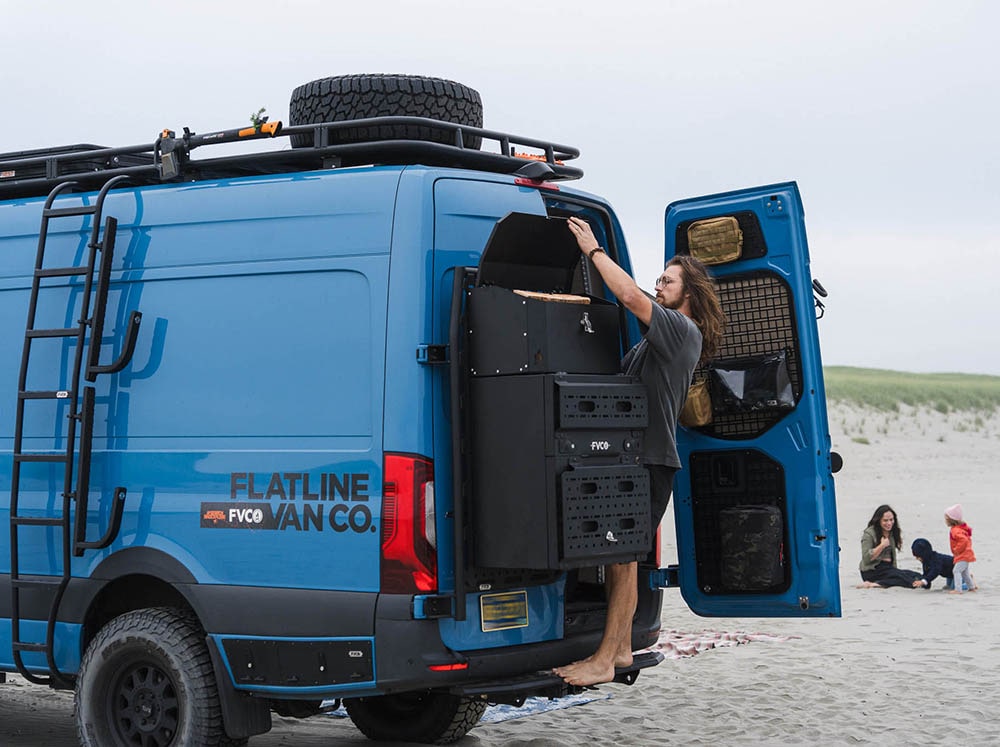 Getting firewood out of the Adventure Van Gear Box