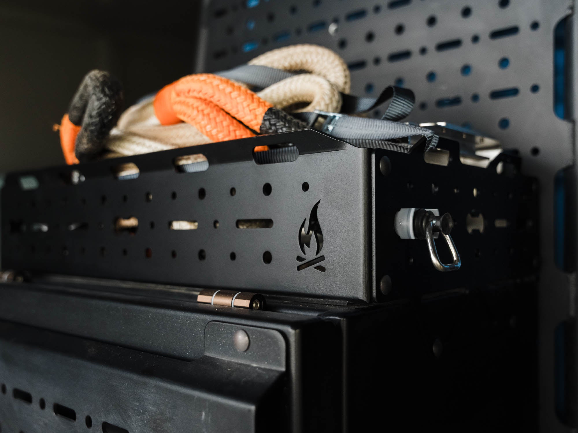 Rear Storage Box Topper with L-track cut out and tie-down straps in use