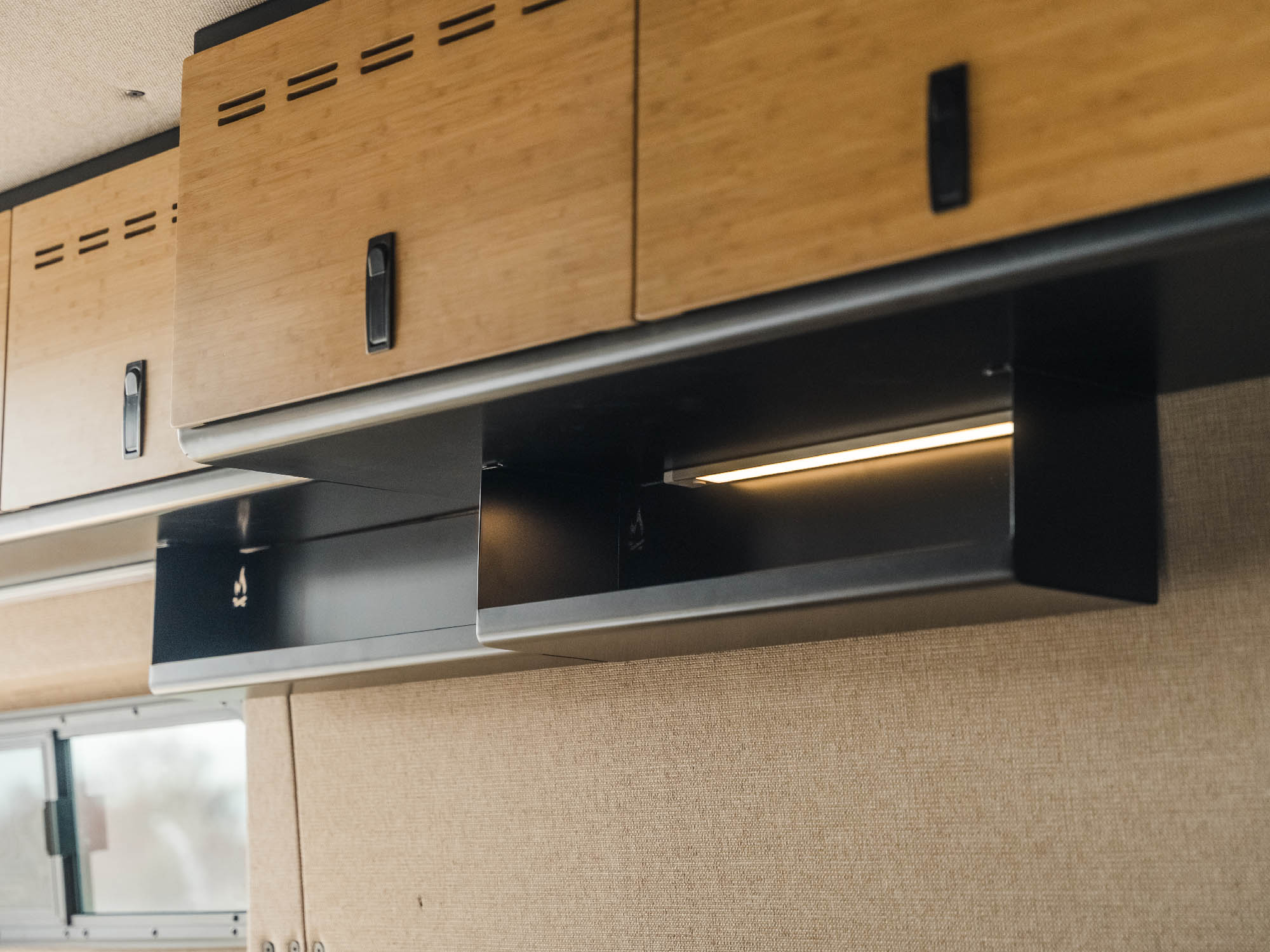 Under Cabinet Shelves installed in Sprinter camper van