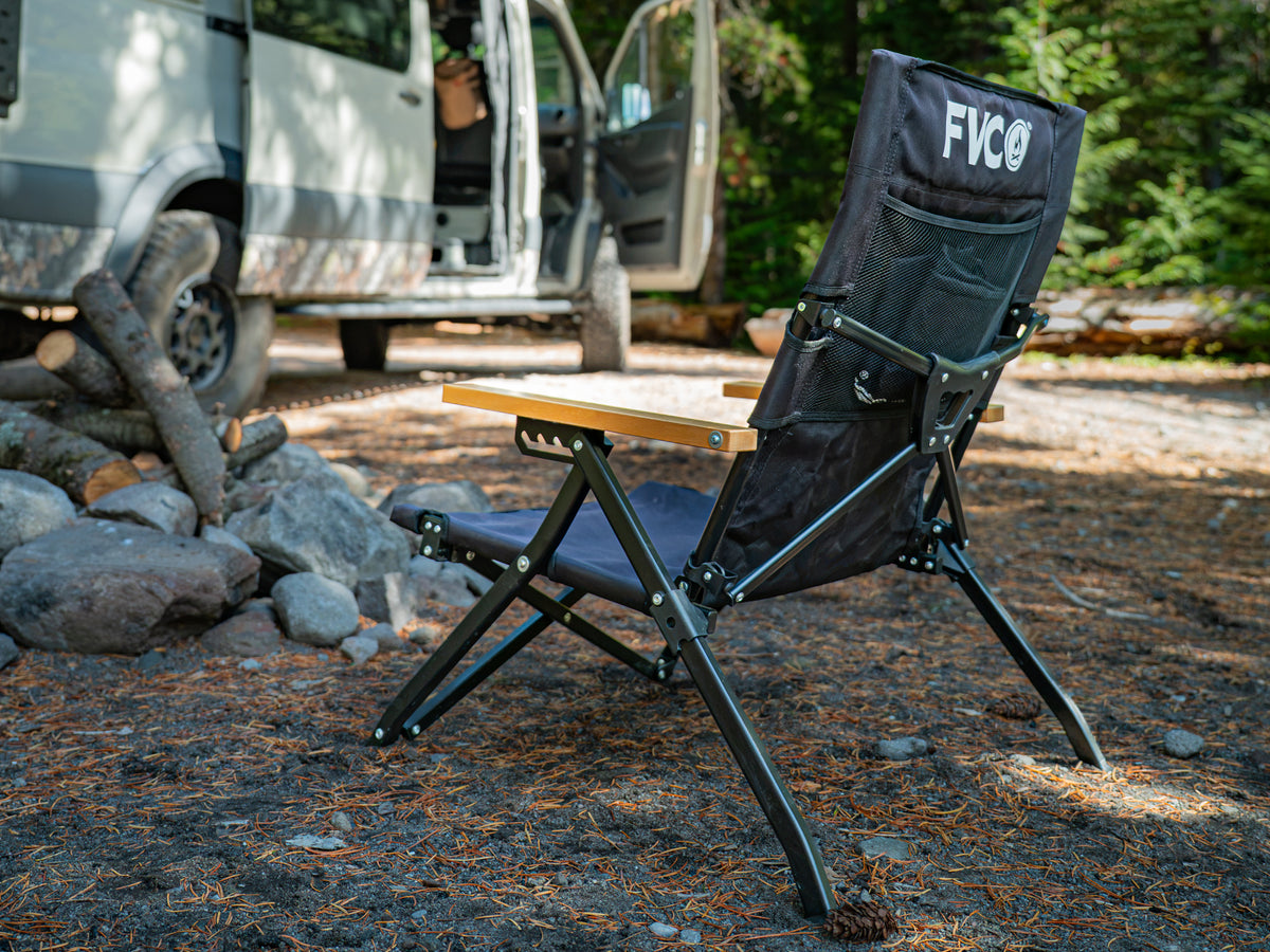 FVC Camp Chair unfolded at camp by the fire pit