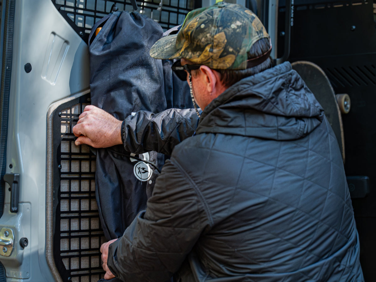 Securing FVC Camp Chairs to molle panel with elastic strap