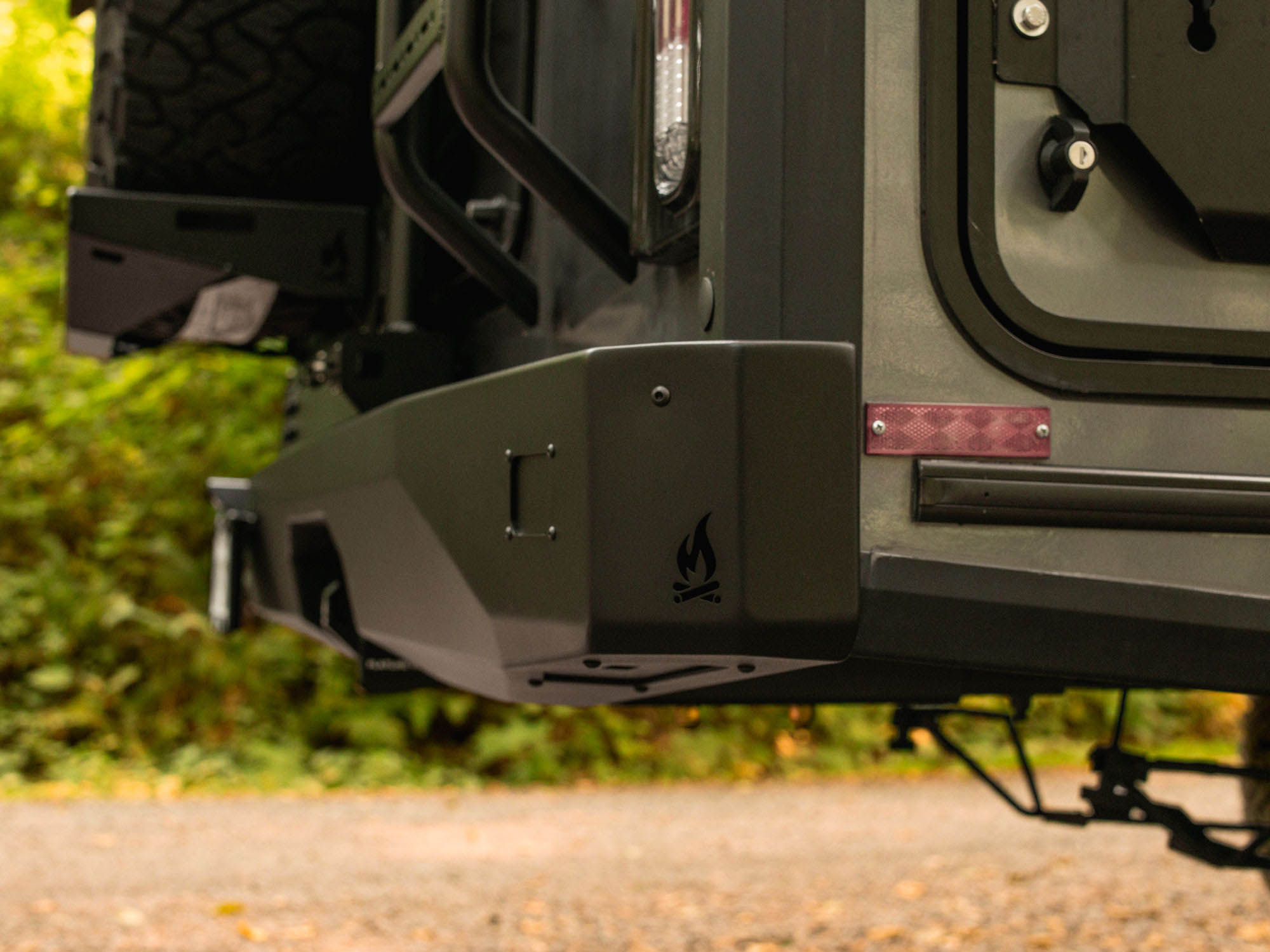 Detail view of FVC logo on Winnebago Ekko Rear Bumper for Sprinter and Transit
