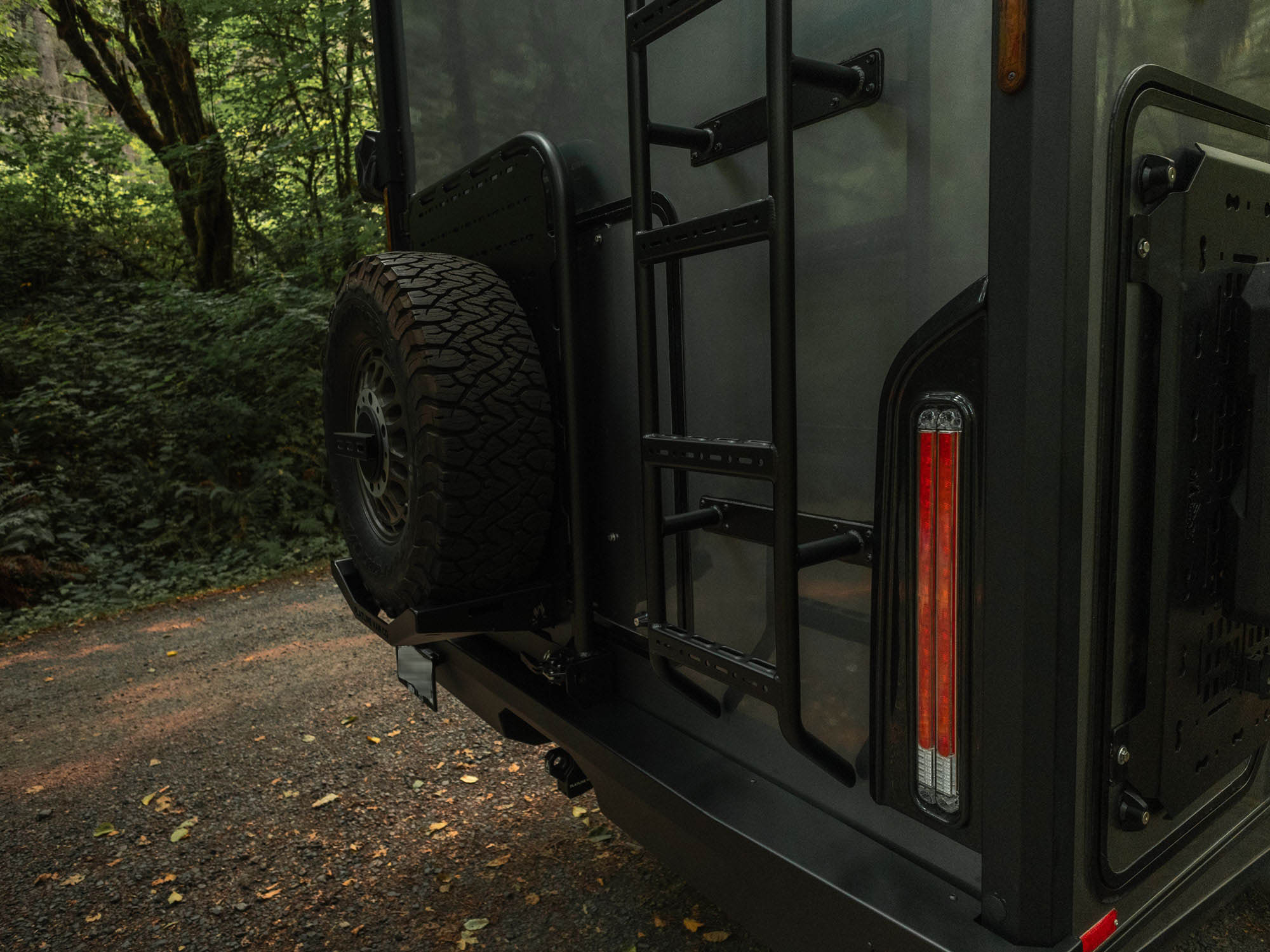 View of upgraded aftermarket Winnebago Ekko Rear Bumper for Sprinter and Transit vans installed