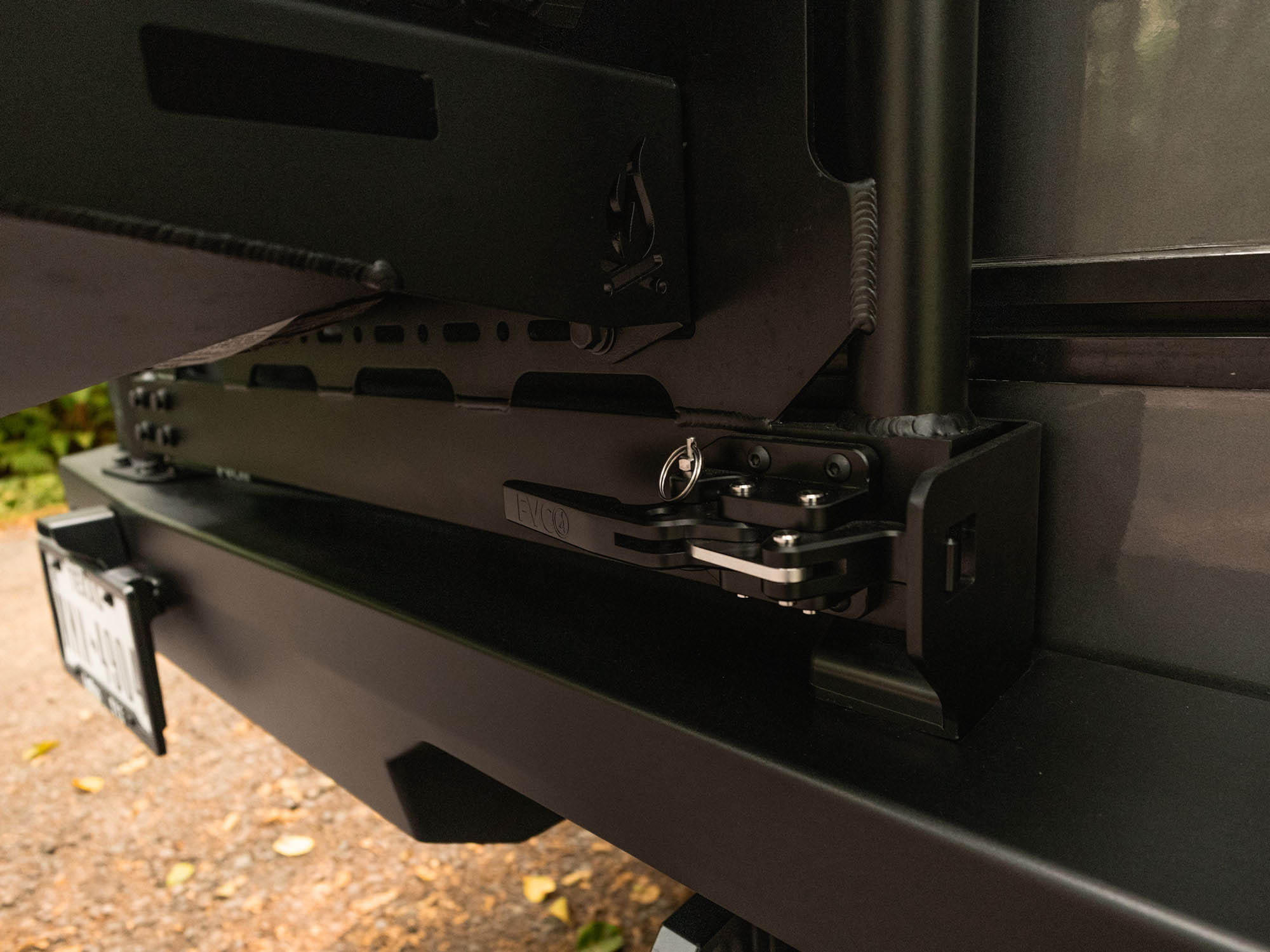 Detail view of FVC-made custom cam latch that stays shut and secure even on bumpy roads and made for rust and corrosion resistance