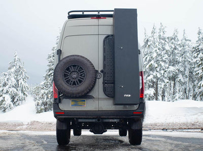 Flatline Van Co. Sprinter Van Rear Door Emblem installed on van with Rear Spare Tire Carrier and Ski Locker