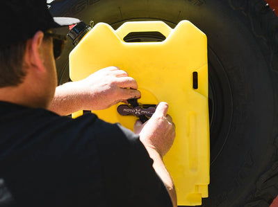 Tightening Rotopax pack mount on Tire Carrier Rotopax Adapter