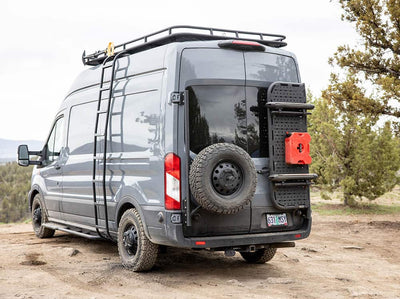 Ford Transit van with rear door tire carrier and other accessories