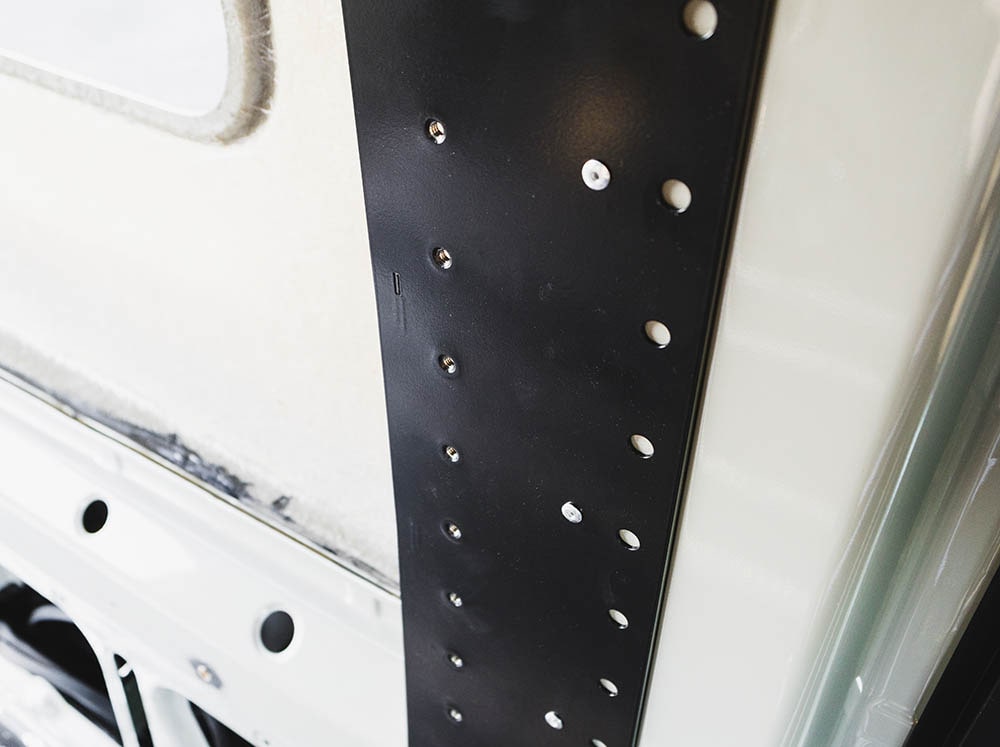 Detail view of Sprinter Bed Bracket mounting holes