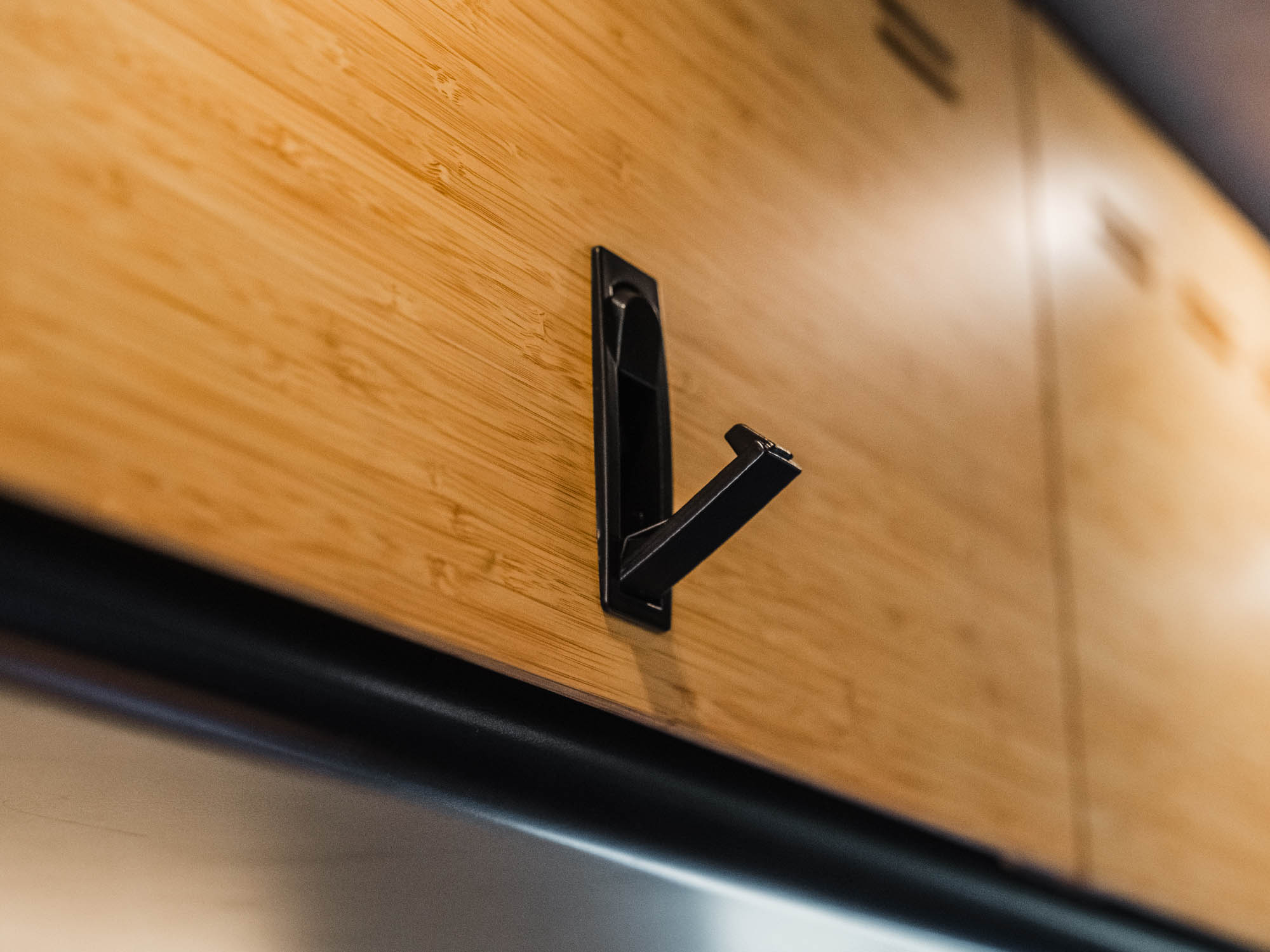 Push-lock latch on Upper Cabinets for camper vans
