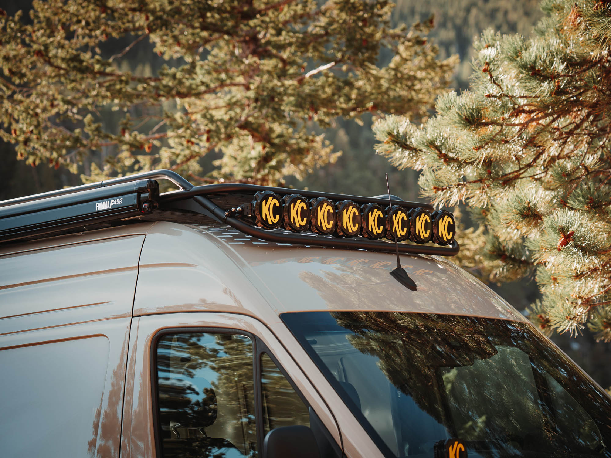 Sprinter Van Safari Roof Rack with KC lights installed on drop front bar