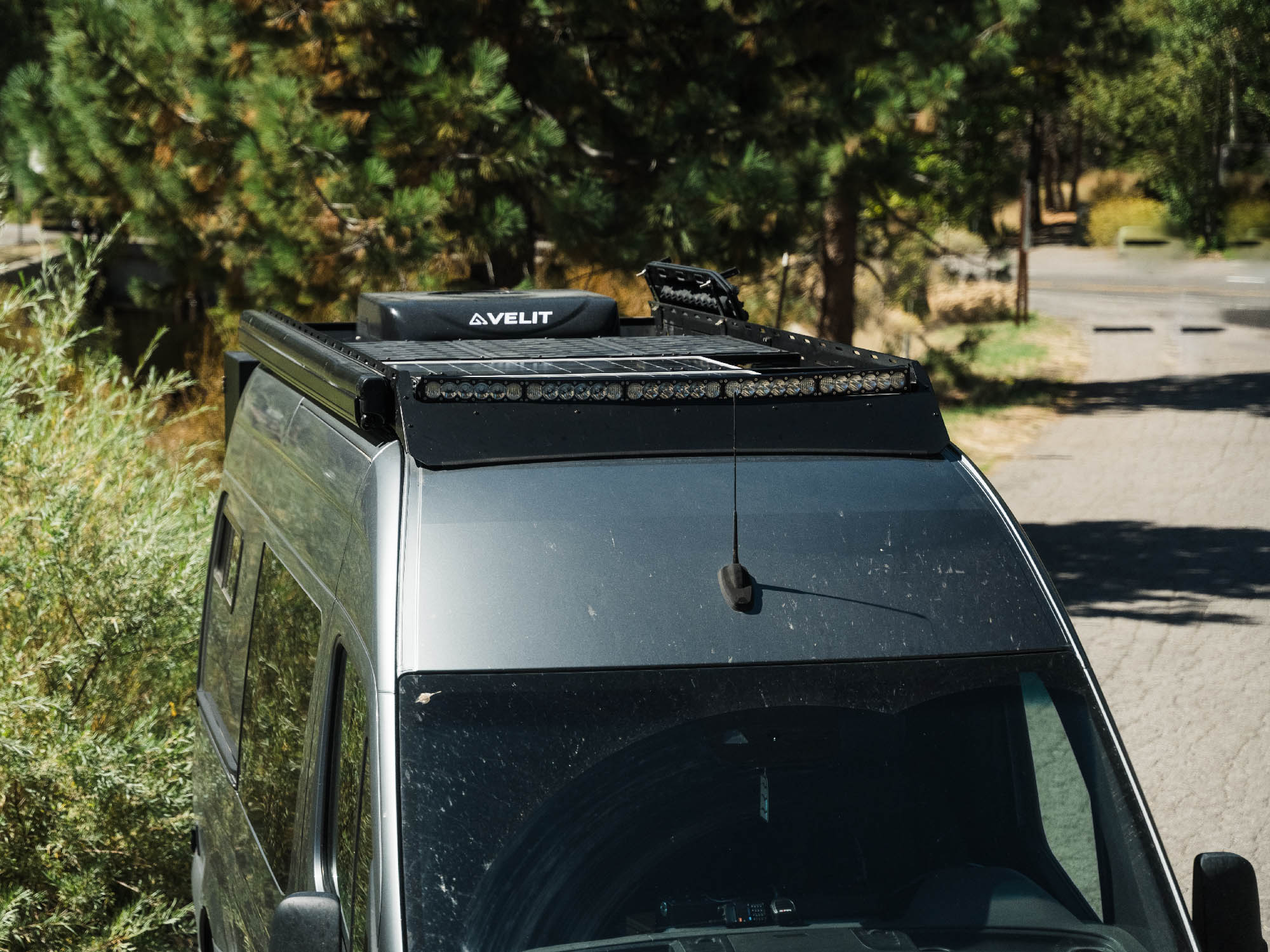 Sprinter Standard Roof Rack installed on adventure van with light bar fairing