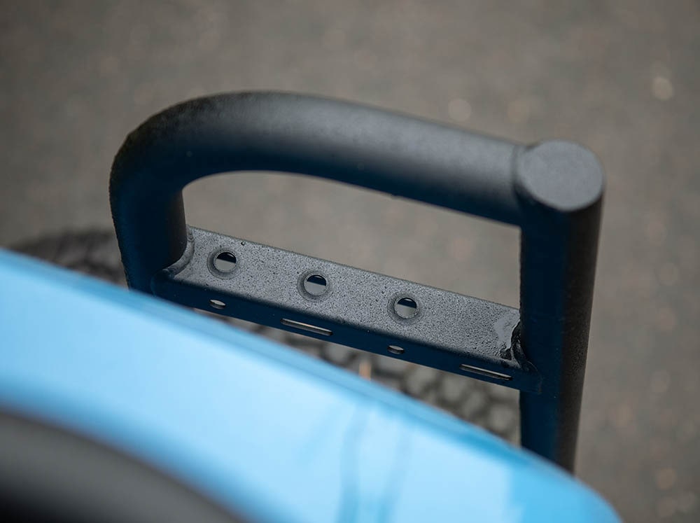 Detail of dimples in ladder rung steps of Sprinter Ladder + Tire Carrier