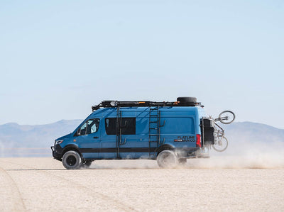 Sprinter adventure van equipped with surf pole and surf hooks