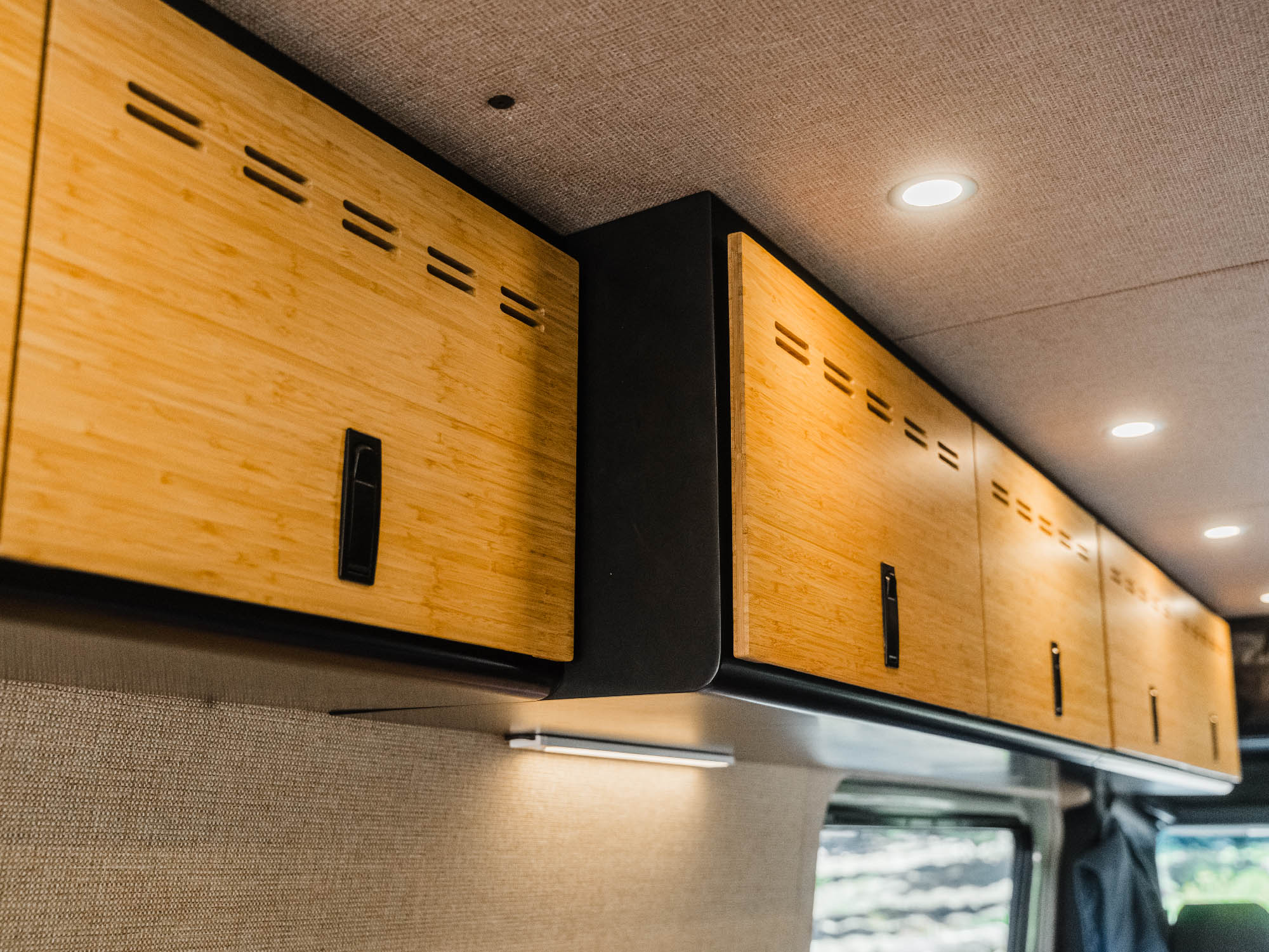 Sprinter Van Shallow Upper Cabinet installed next to full-depth upper cabinet