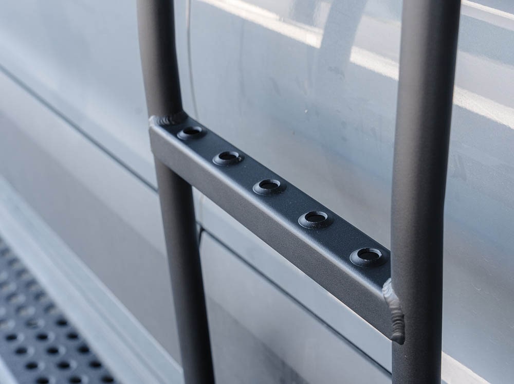 Close up of dimpled traction on flatline van co ladder for Transit Trail