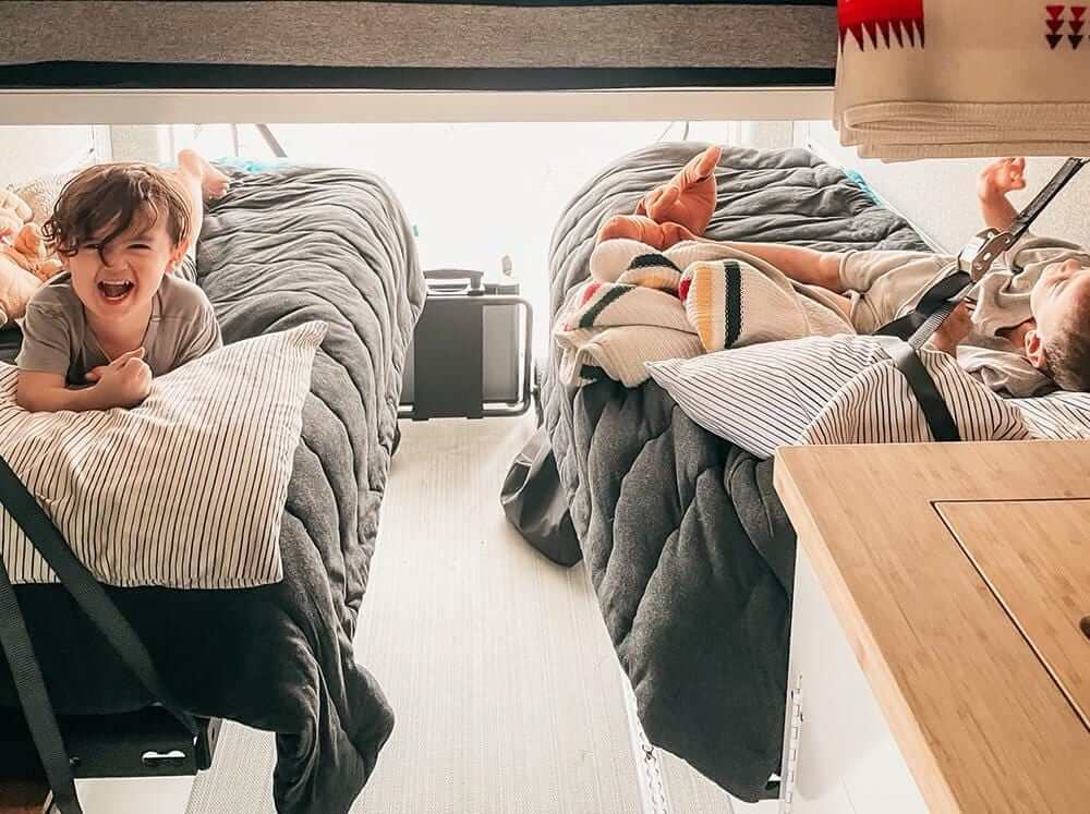 Happy kids on their solo beds